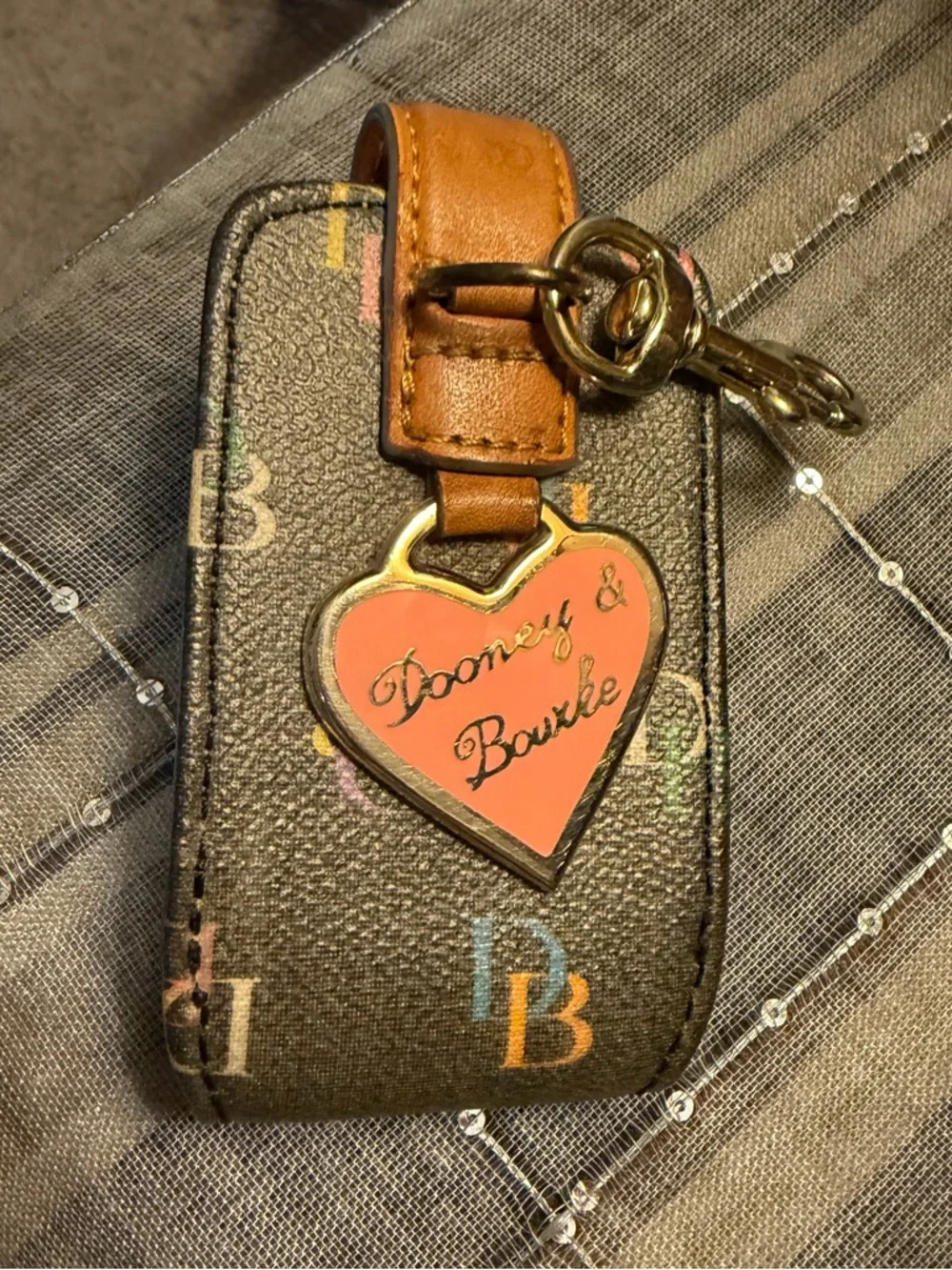 Dooney & Bourke Black Multicolor DB Cellphone Case Hand sanitizer/Lotion Holder